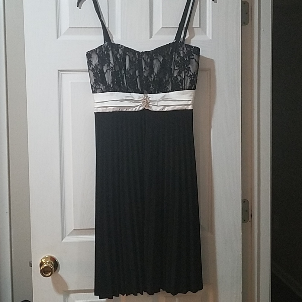 Black and white lace bust knee length dress